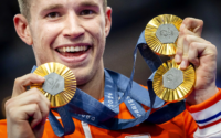 Harrie Lavreysen met zijn drie gouden medailles.